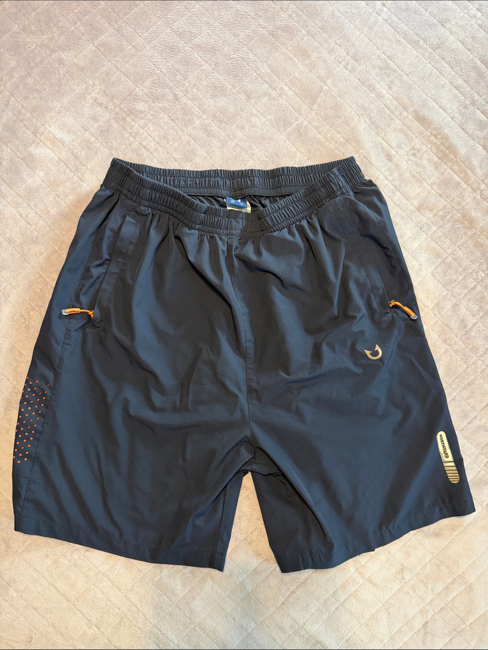 Amazon Men's Black Athletic Shorts with Orange Accent Pulls